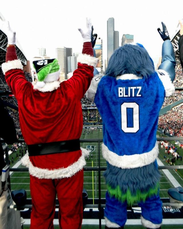 Santa and Blitz cekebrate another Seattle Seahawks Win
